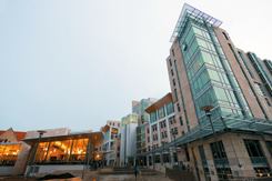 University of Chicago’s eight-story South Campus Residence Hall was designed with transparency and openness in mind. It is divided into eight four-story houses, each with internal staircases and spacious lounges. The building also features two courtyards, two large common areas, a reading room, music room, and a street-level café and convenience store. A short walk from the main campus, South Campus Residence Hall engrosses students with its carefully planned community feel, while they absorb natural light through the many windows that envelop the airy building. Many of the building’s residents feel South Campus Residence Hall is the most social dormitory on campus, due partly to the building’s spaciousness and transparent exterior.