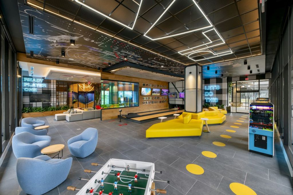 Three Collective's game room brings the community together with a bowling alley, virtual reality, and more.