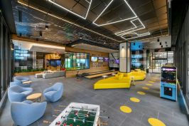 Three Collective's game room brings the community together with a bowling alley, virtual reality, and more.